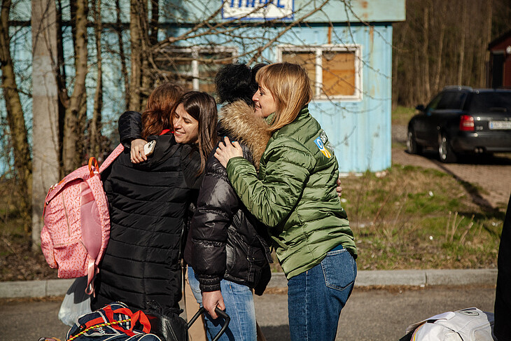 Saved Ukrainian children with their families